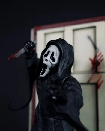 Ghostface figure from Scream with knife, mask, and horror diorama base.