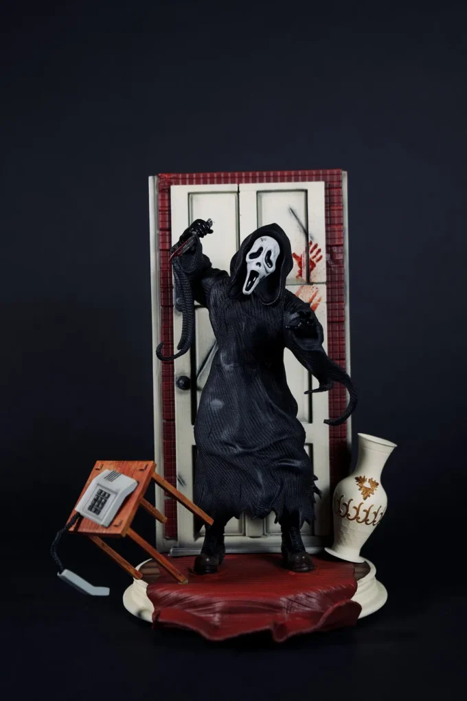 Ghostface figure from Scream with knife, mask, and horror diorama base.
