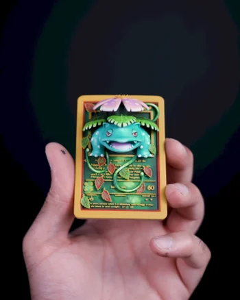 3D Venusaur Pokémon card magnet with leaves and a blooming flower bursting from the card.