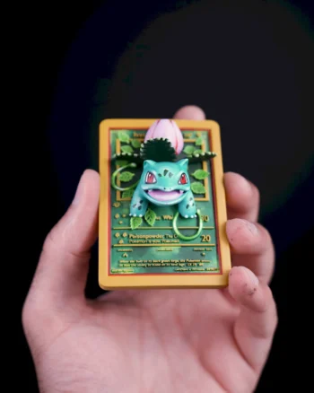 3D Ivysaur Pokémon card magnet with vines and a budding flower bursting from the card.