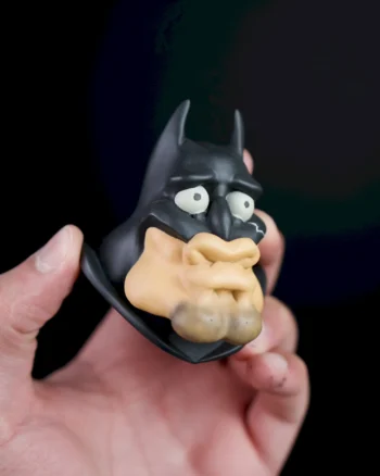 3D Batman parody magnet with exaggerated facial features in a humorous sculpt.